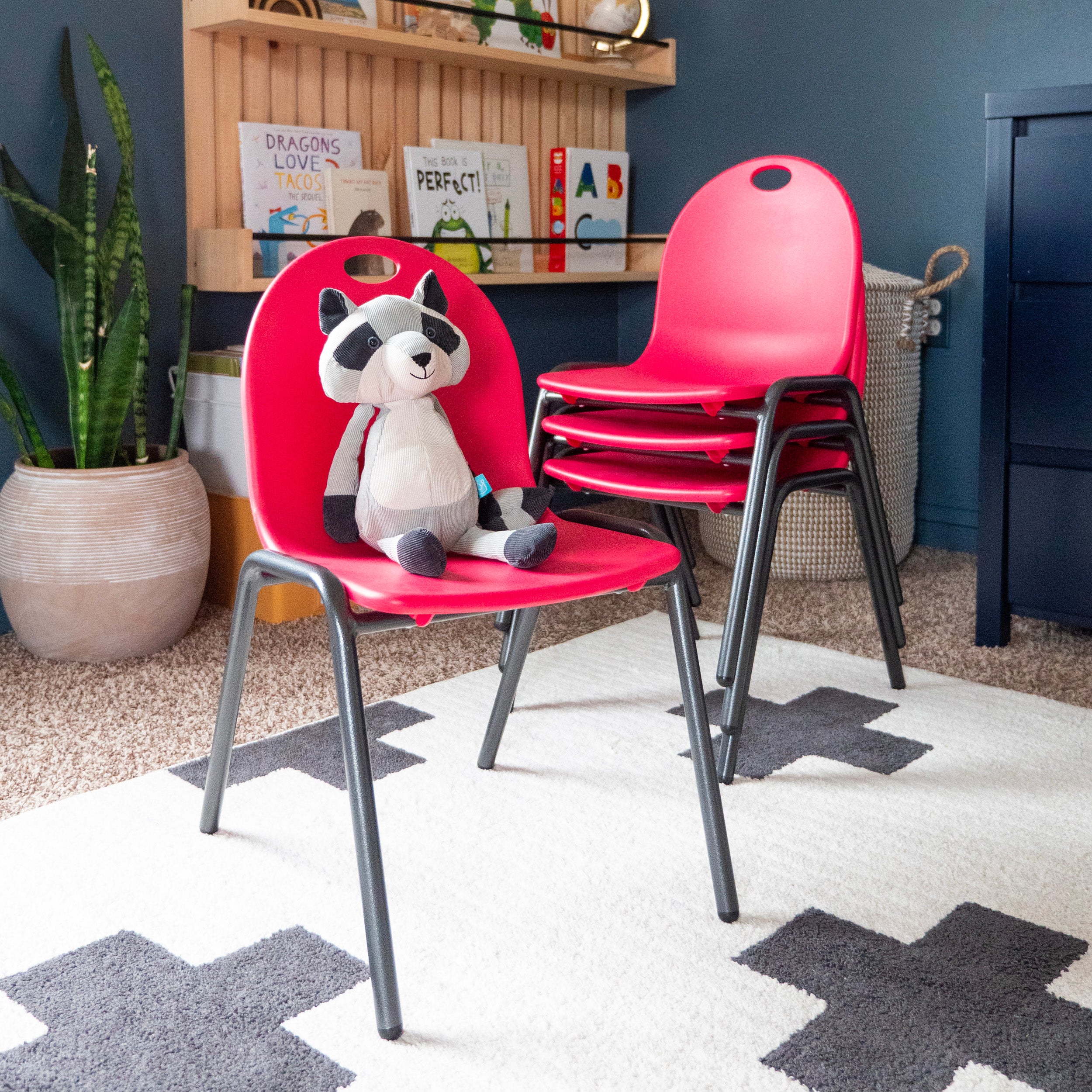 stuffed animal on stacking chair