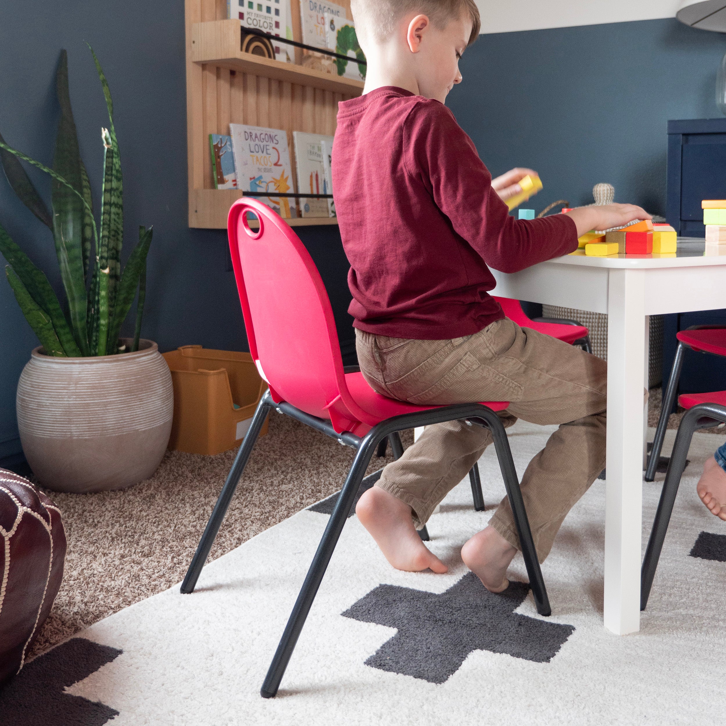 child on Stacking Chair