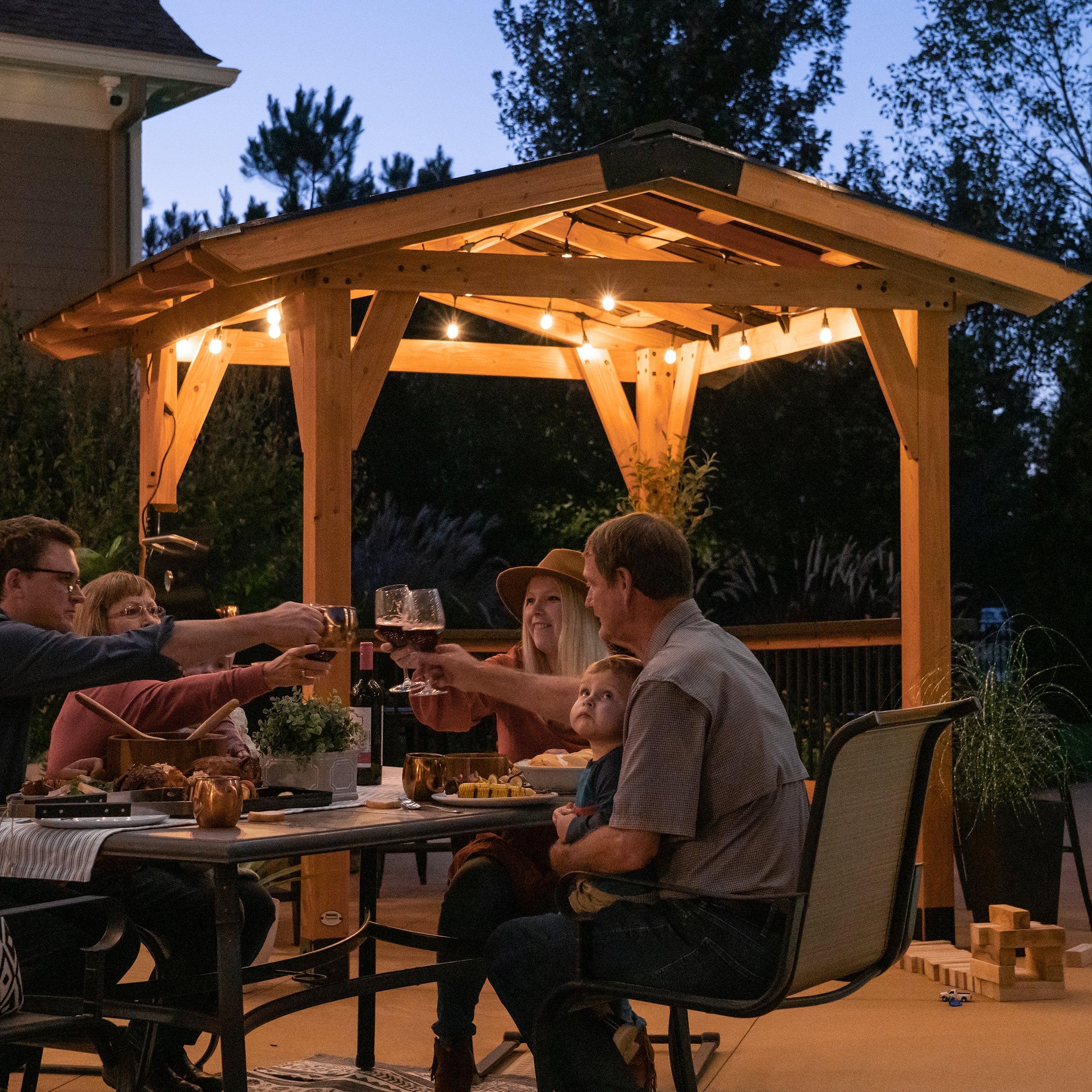 Family dinner party next to Granada Grill Gazebo