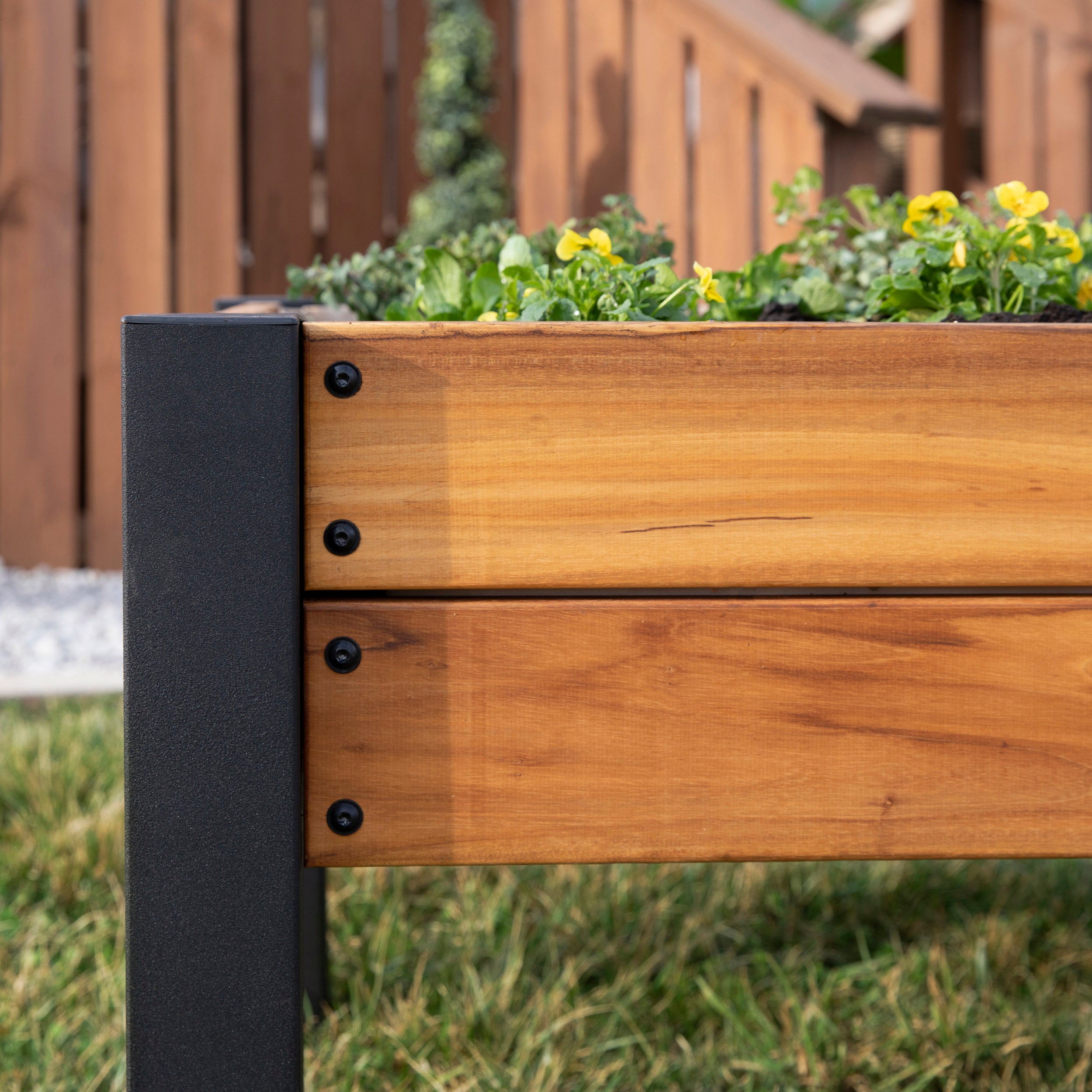 Raised Teak Planter close up